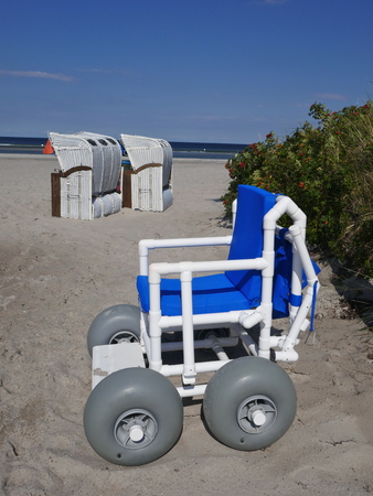 Beach wheelchair on the beachの写真素材