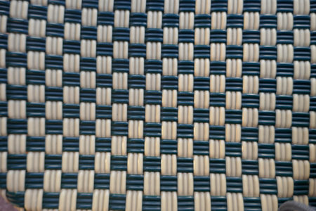 Texture of braided plastic closeup photo.