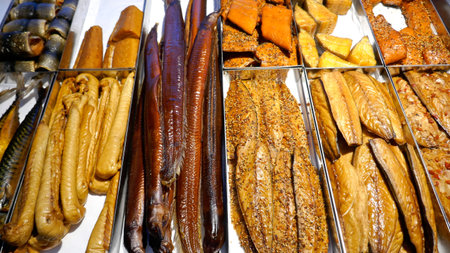 Fresh smoked fish at the fishing port in Travemuende, Schleswig-Holstein Germany.の写真素材