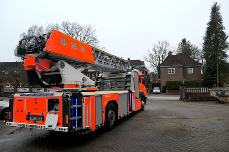 Hamburg, Germany - 9.1.2021, Modern fire truck. Fire truck with articulated turntable ladder,...