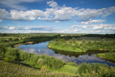 North river flows through the valley among the fields and villages