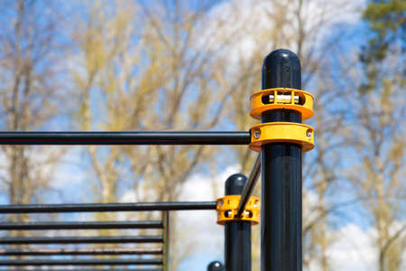 Equipment for strength training. Workout. Metal crossbar for street sports. A complex to support health and muscle tone. Outdoor sportsの写真素材