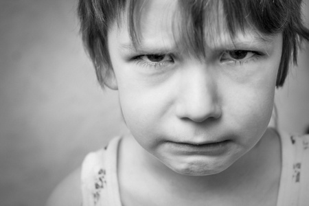 portrait of a sad boyの写真素材