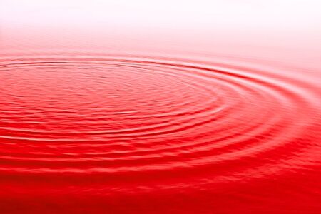 red background with waves, 	surface waterの写真素材