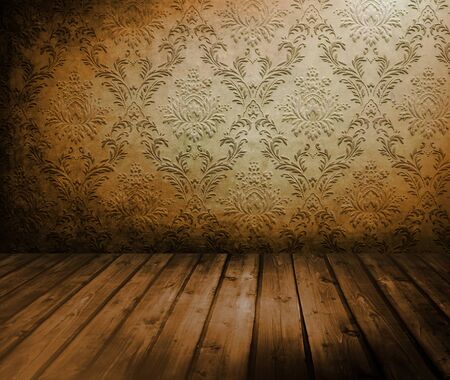 room with wooden floors and old wallpaperの写真素材