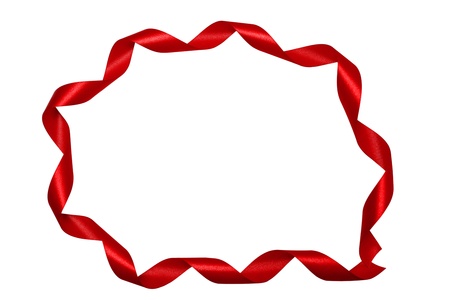 Shiny red satin ribbon on white backgroundの写真素材