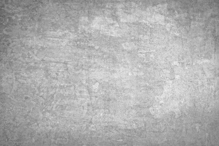 Grunge  texture of a dilapidated wall in a gray toneの写真素材