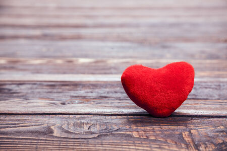 Love heart on breakage wood texture backgroundの写真素材