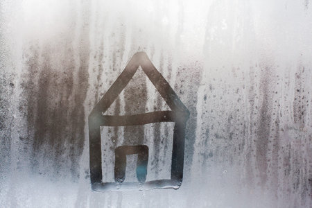 Hand draw on glass and water drop.の写真素材