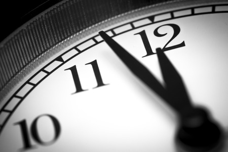 Photo alarm clock, arrow close to12 hours Photo alarm clock, arrow close to12 hours