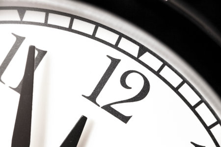 Photo alarm clock,  arrow close to12 hours