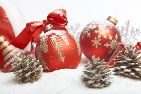 Christmas ball with red bow and ribbonの写真素材