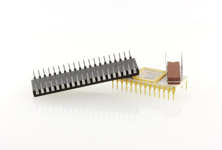 Group of three microchips different sizes on white