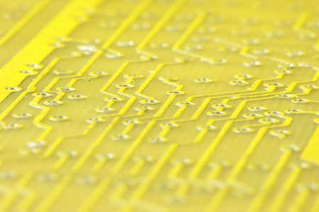 close-up of yellow computer circuit board