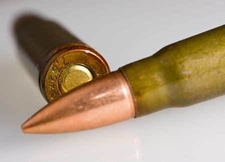 7,62mm cartridges over white backgroundの写真素材
