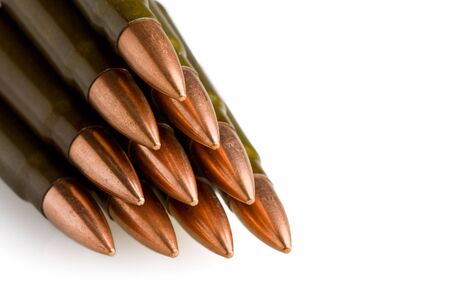 Bullets pile isolated on white with space for textの写真素材