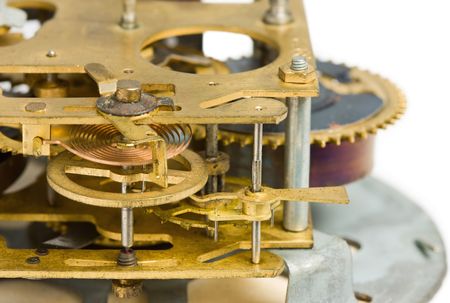 Ancient dismantle alarm-clock isolated on white backgroundの写真素材