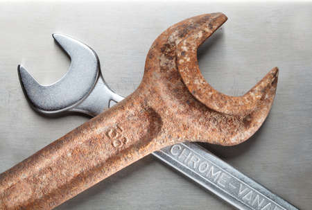 Macro of ancient and modern wrenches as opposition conceptの写真素材