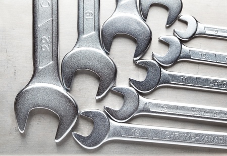 Set of new spanners over stainless steel backgroundの写真素材