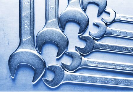 Macro of wrenches metallic blue tinted on stainless steel backgroundの写真素材