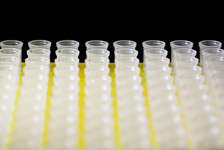 Macro of laboratory tubes pack isolated on black backgroundの写真素材