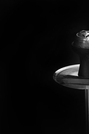 Hookah stands on a black background. Great place to insert.
