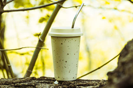 Reusable glass and straw on nature background.の写真素材