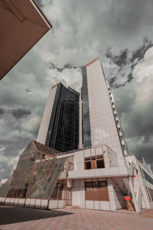 Odessa, Ukraine. September 18, 2021 - tall multi-storey hotel in Odessa near the sea on a cloudy day. High quality photoのeditorial素材