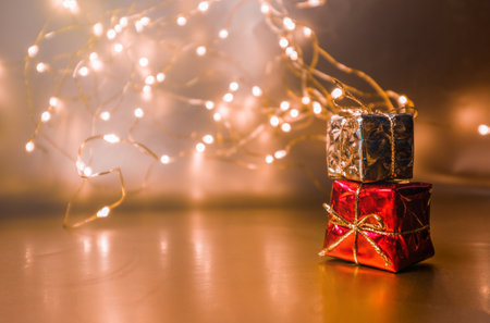 Christmas gold background with gifts in gold packaging. High quality photoの写真素材