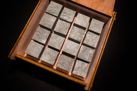Whiskey stones in a wooden gift box. High quality photo