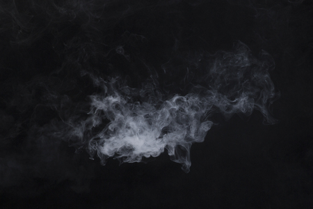 white smoky cloud on black backgroundの写真素材