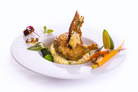 supreme of farmer's chick with baby carrot and zucchini riceの写真素材