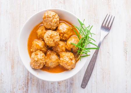 Bowl with meatballs and tomato sauce. studio shotの写真素材