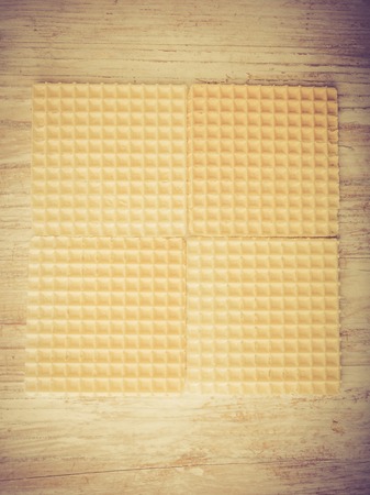 Dry wafers on white wooden table. studio shotの写真素材