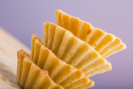 Fresh lower part muffins without cream on a wooden board. studio shotの写真素材