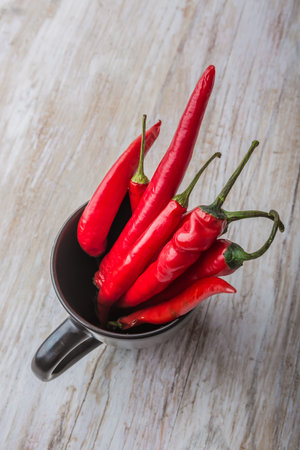 Red Hot Chili Peppers in a black cup. studio shot