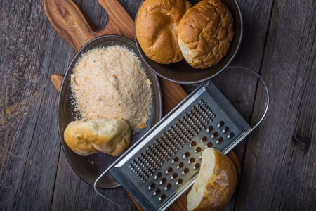 homemade breadcrumbs on a old wooden table. studio shotの写真素材