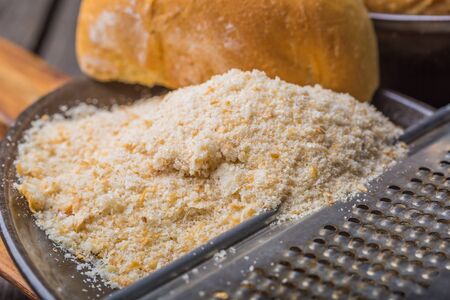 homemade breadcrumbs on a old wooden table. studio shotの写真素材
