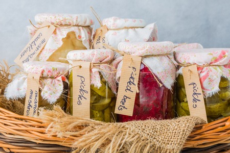 Homemade preserved vegetables in jars. studio shotの写真素材