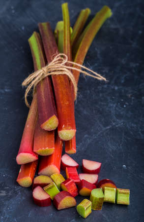 fresh rhubarb on a black background. studio shotの写真素材