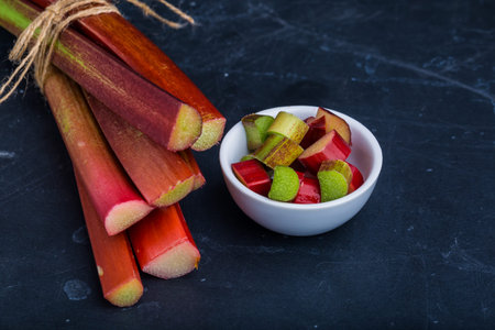 fresh rhubarb on a black background