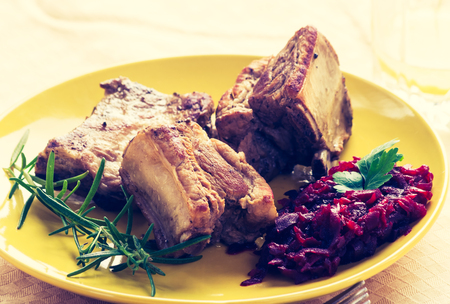 Vintage photo of roasted ribs wirh beetsの写真素材