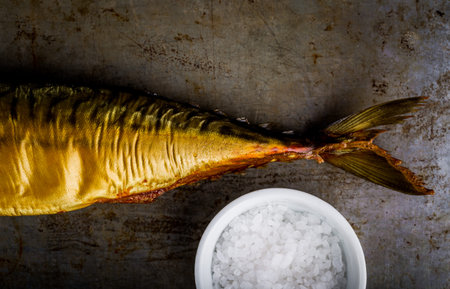 Smoked mackerel on metal background, studio shot