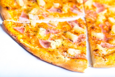 Hawaiian Pizza isolated on white background, studio shotの写真素材