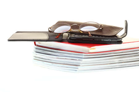 glasses eBook reader pile of books, isolatedの写真素材