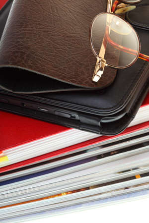 glasses eBook reader pile of books, isolatedの写真素材