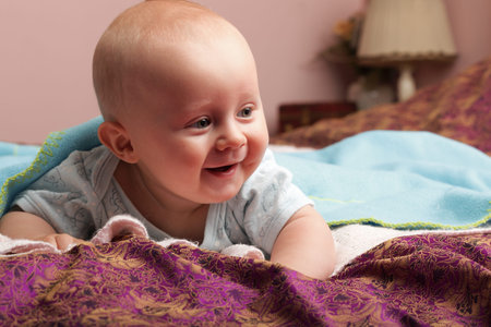 portrait of 6 months male child baby boy in blue eye