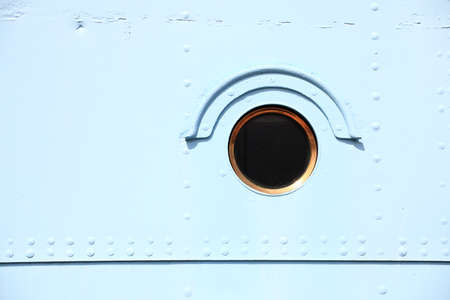 Ship window steel blue background outdoor colourの写真素材