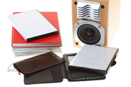 eBook reader pile of books, isolated on white multimedia black audio speakerの写真素材