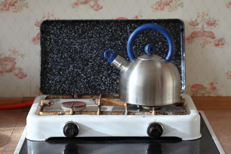kettle and gas cooker on modern kitchenの写真素材